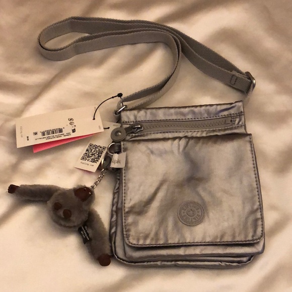 Kipling NWELDORADO Smooth Silver Metallic Crossbody With Monkey Key Chain NWT - Picture 2 of 16